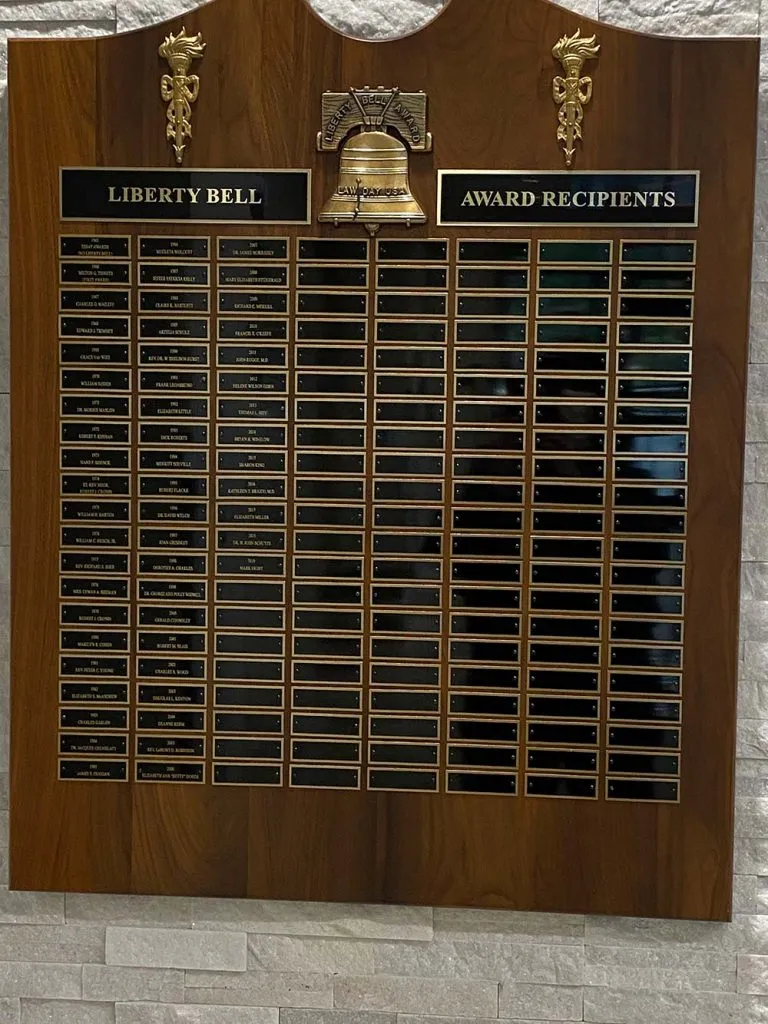 wood plaque with nameplates